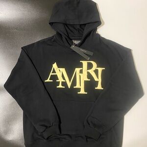 AMIRI Black Hoodie with Bold Gold Lettering